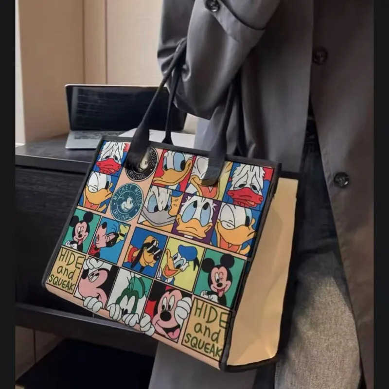 Disney 2025 Disney New Mickey Pluto Large Capacity Womens Canvas Bag Cartoon Casual Shoulder Commuting Mummy BagXJ250515