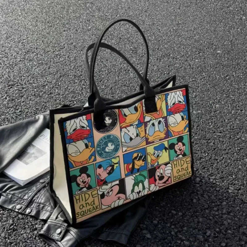 Disney 2025 Disney New Mickey Pluto Large Capacity Womens Canvas Bag Cartoon Casual Shoulder Commuting Mummy BagXJ250515