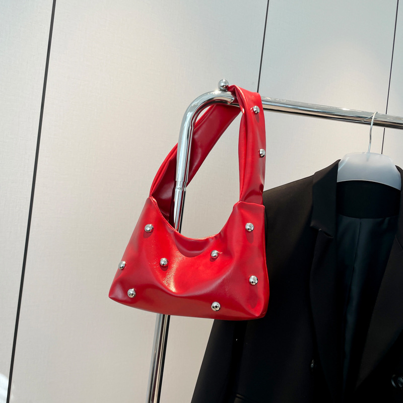 Luxury Bag New Free Delivery Designer Bag High End Crowd 2025 Spring New Rivet Shoulder Handbag Women's Commuting Armpit Bag