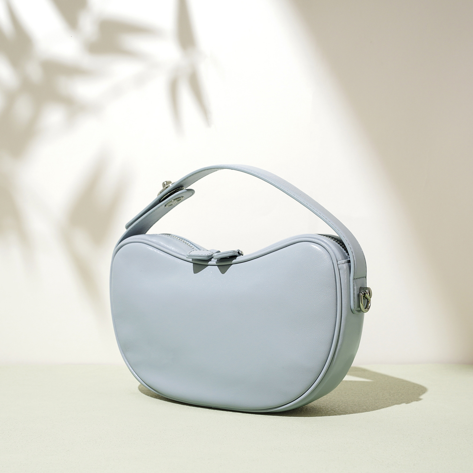 2025S designer pea sheepskin fashionable cashew niche design shoulder temperament high-end mother and child crossbody women bag