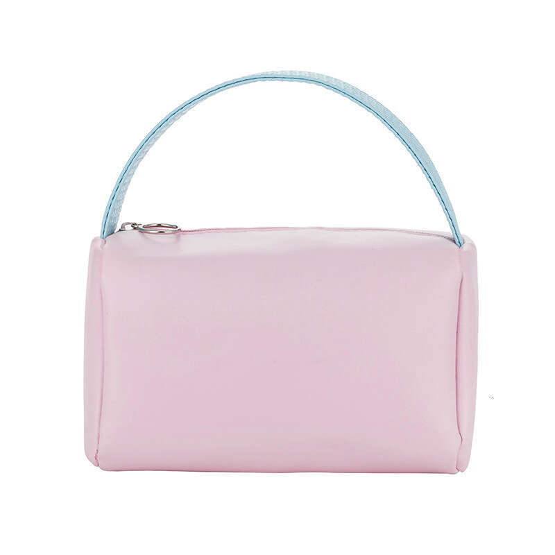 Candy colored bag with high-end storage, large capacity handheld PU waterproof makeup bag, high beauty women's handbag