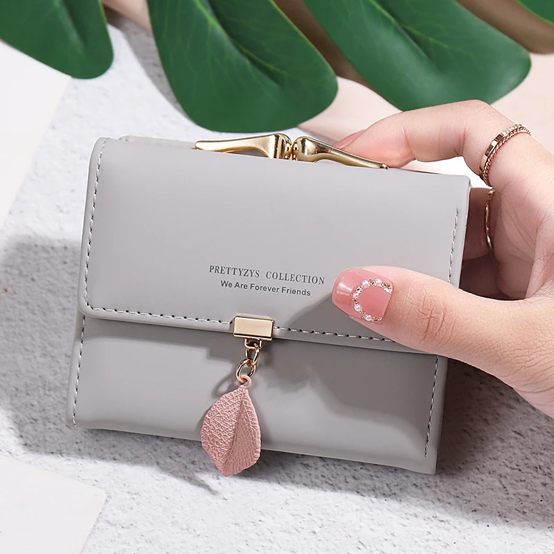 summer Explosion-style womens short wallet Korean PU leather simple everything with solid color personality leaf pendant b 250514