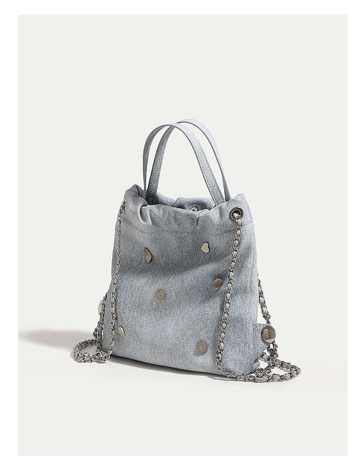 Small backpack with niche design, denim leather chain women's 2025 Korean version, casual backpack, hand-held, single shoulder, new style, unique