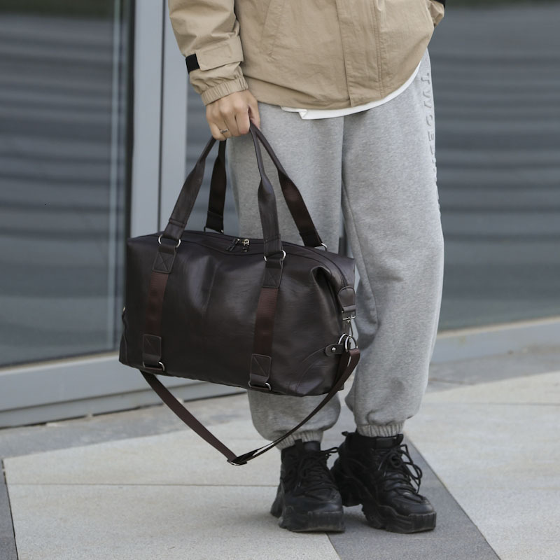 Free shipping on 2025 new designer bags Top quality Brand High Quality Designer Bag Korean version men's handbag, large capacity luggage