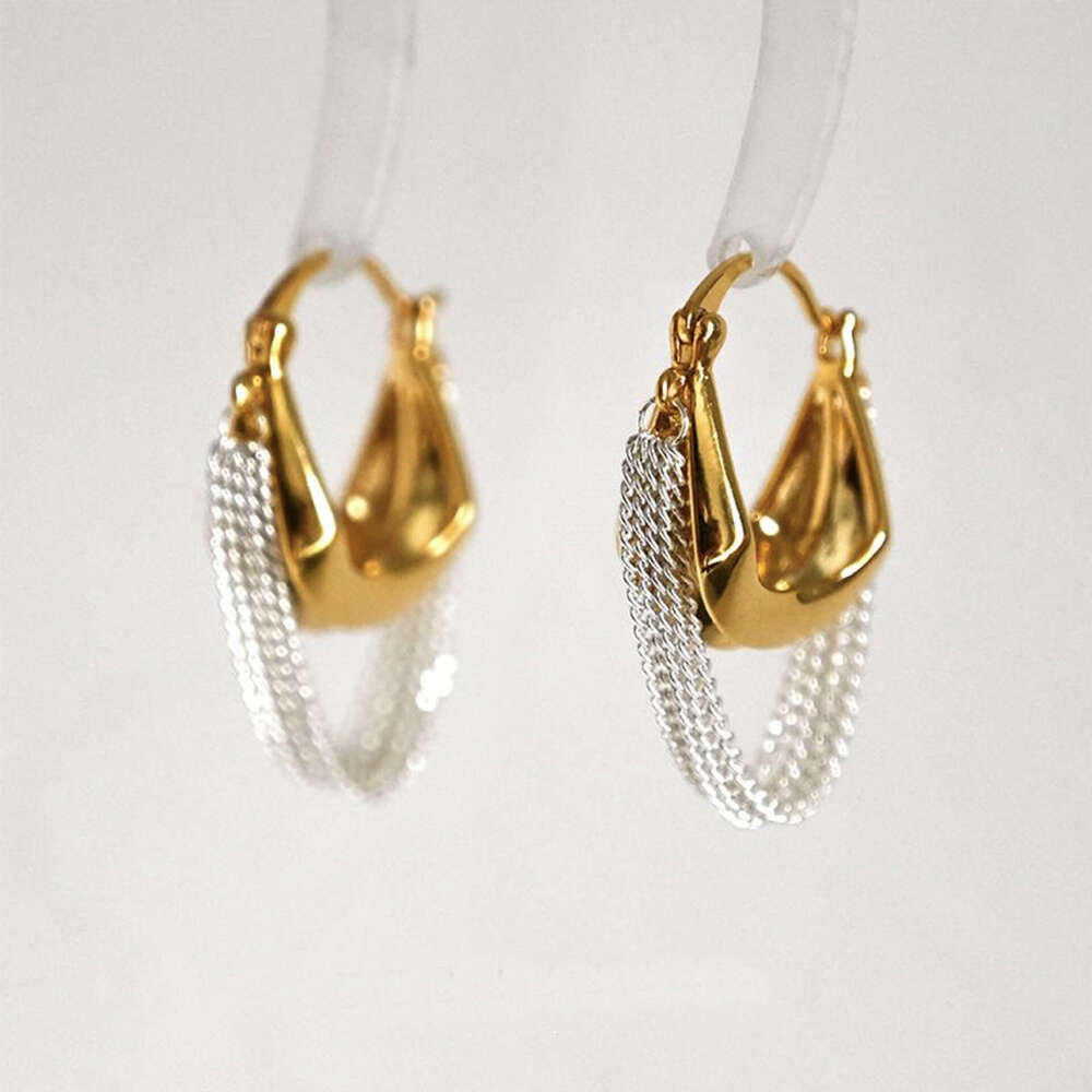 New light niche handbag tassel design for women's fashion personality cold style French earrings