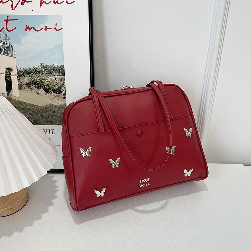2025 Spring And Summer New Tote Fashion Trend New Free Delivery Designer Bag Pillow Handheld Shoulder This Year's Luxury Bag Popular Women's