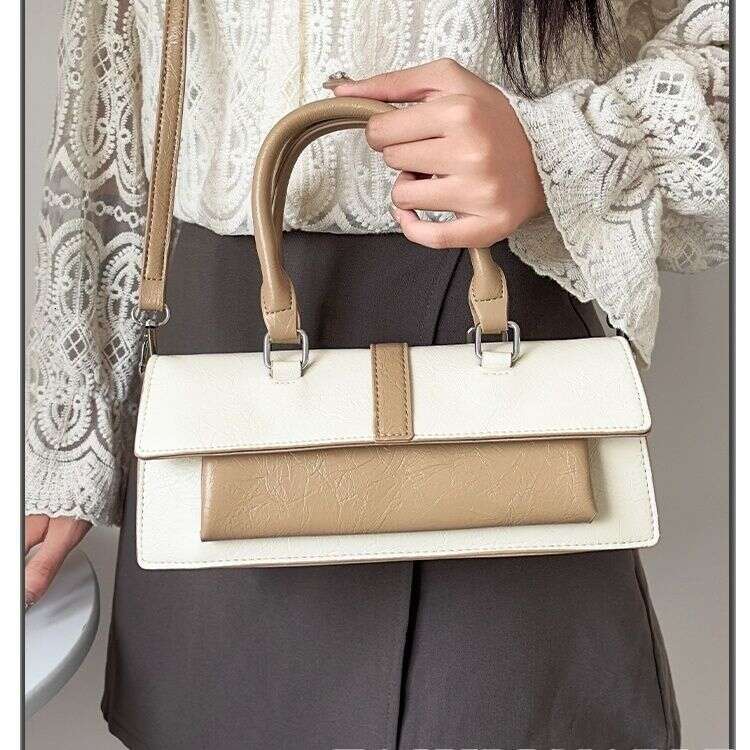 Niche 2025 new high-end crossbody handbag shoulder motorcycle ins Japanese Korean French stick bag