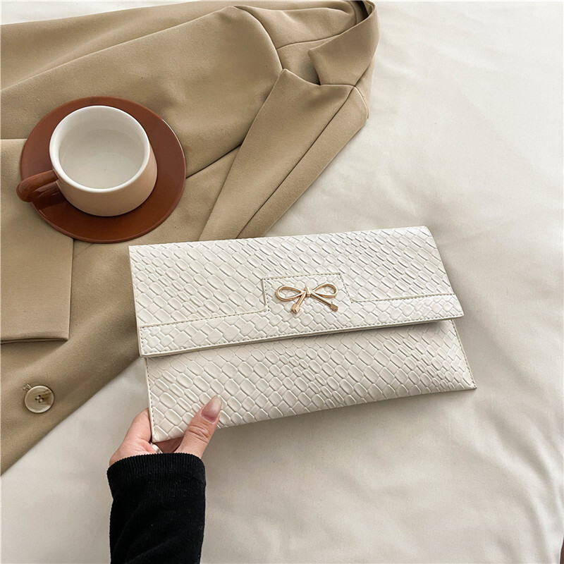 2025 New Urban Simple Fashion Trendy Bow New Free Delivery Designer Bag Luxury Bag Stone Pattern Bright Face Single Shoulder Underarm Small Square Wom