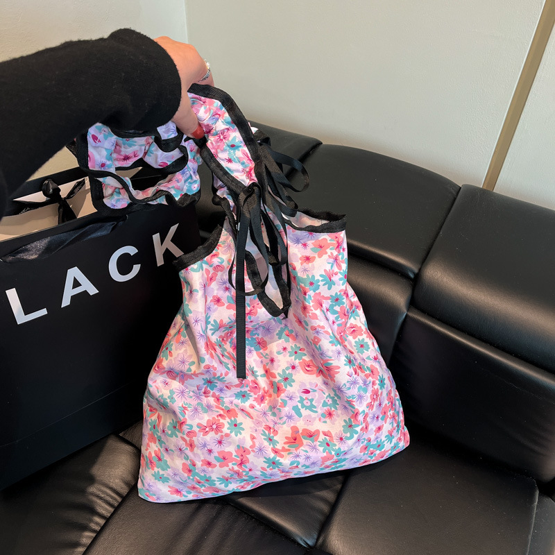 2025 New Sweet And Cute Folded Shoulder Summer Small Fresh Wave Point Bow Luxury Bag Cloth New Free Delivery Designer Bag Commuter Bag For Women