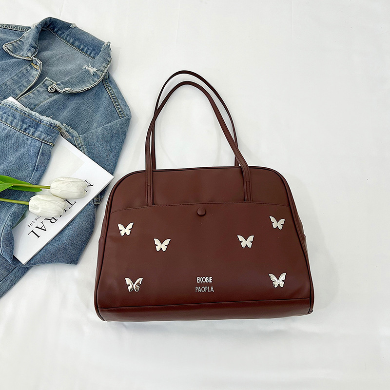 2025 Spring And Summer New Tote Fashion Trend New Free Delivery Designer Bag Pillow Handheld Shoulder This Year's Luxury Bag Popular Women's