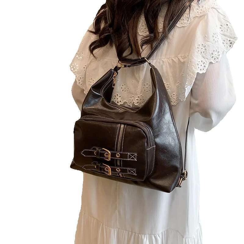 Top brand new free delivery designer bag women's new bag high-end feeling university style student shoulder bag with needle decoration buckle mot