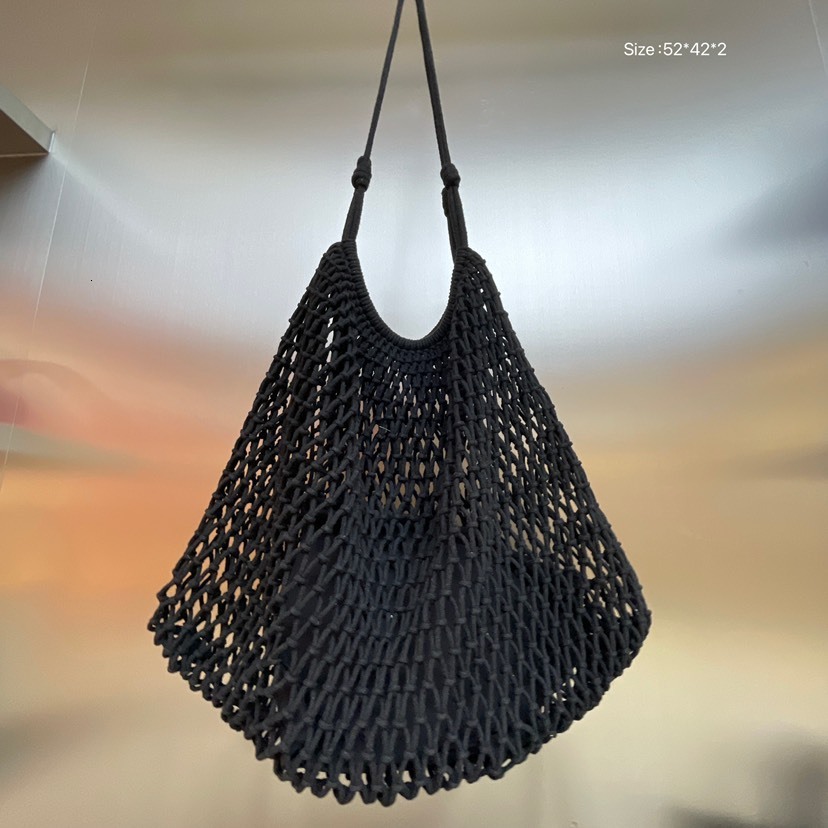 2025S designer hollow women grass new internet famous large capacity seaside vacation woven casual shoulder tote baozi mother bag