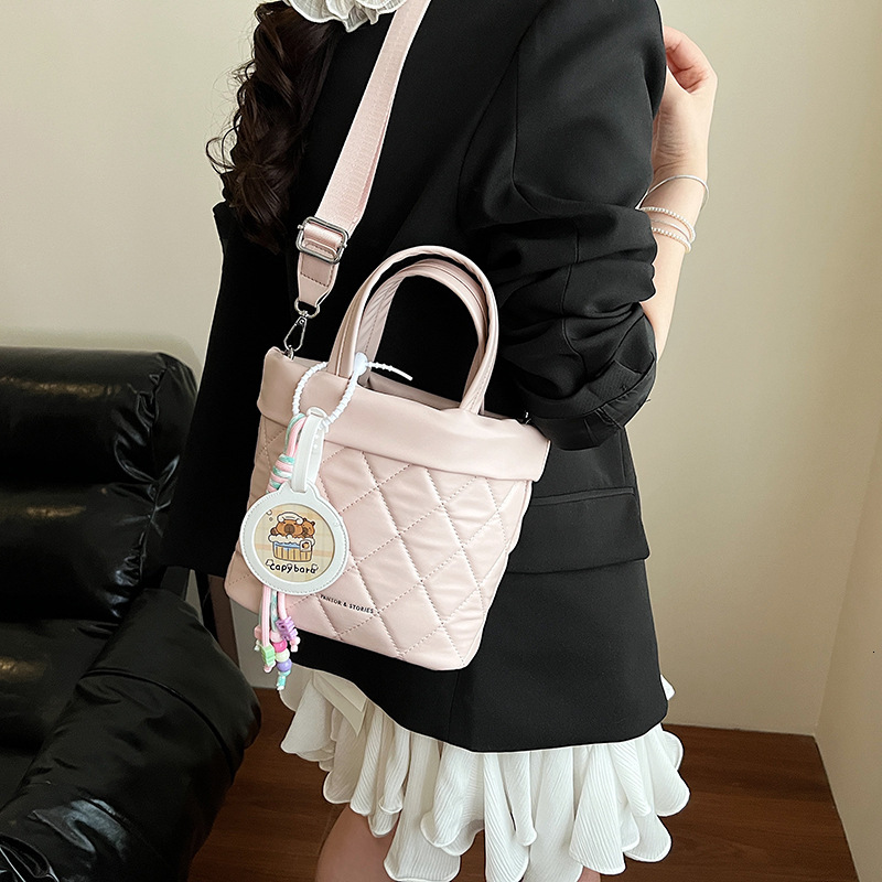 2025 New Lingge Embroidery Line Commuter Handheld Bucket for Women's Leisure Versatile Simple Solid Color Single Shoulder Crossbody Bag