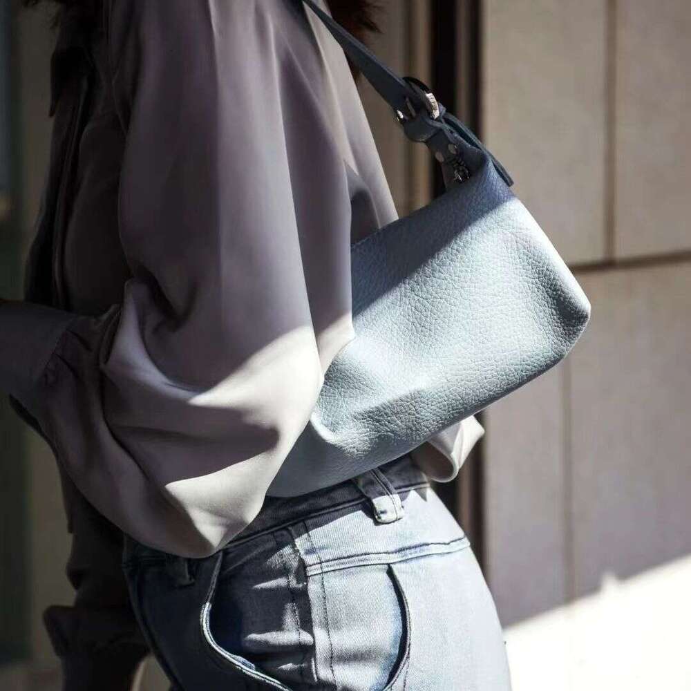 High end versatile armpit soft leather small women's dumpling 2025 autumn and winter French niche crossbody crescent bag