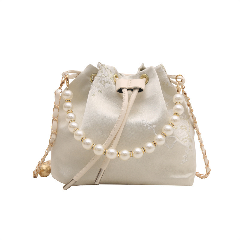 Chinese national bucket 2025 summer new designer embroidery antique versatile high-end style handbag Hanfu accessories crossbody bag