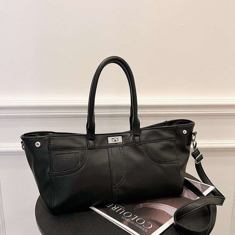 Bag 2025 autumn new item light luxury niche high-end hand-held large capacity fashionable commuting women's bag single shoulder crossbody bag