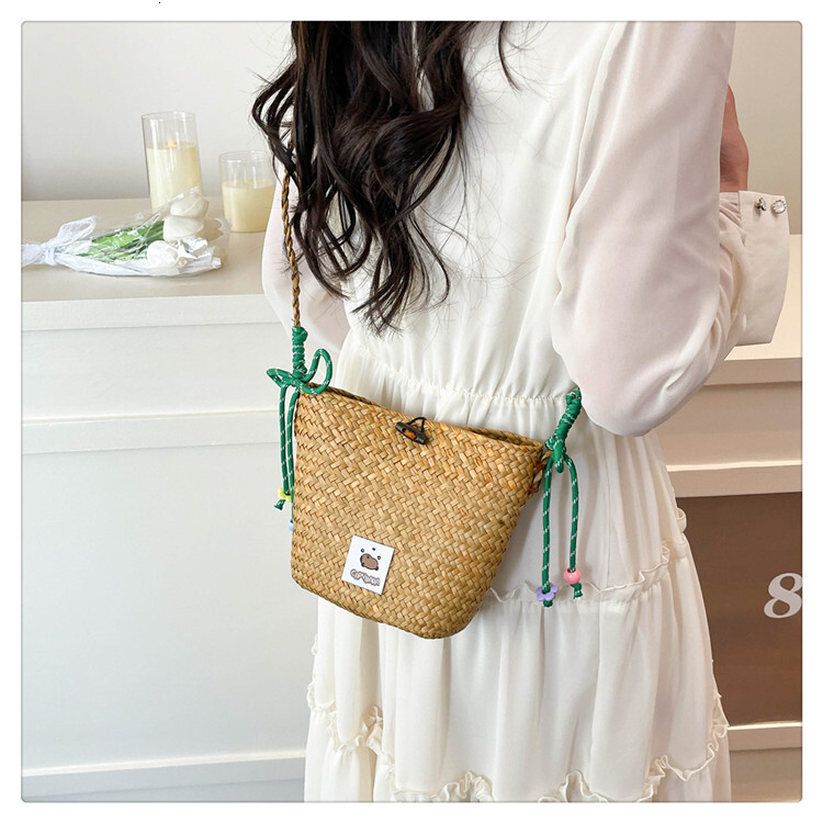 New straw woven lazy casual fashion versatile women's single shoulder crossbody bag beach vacation woven bag solid color simple single shoulder c