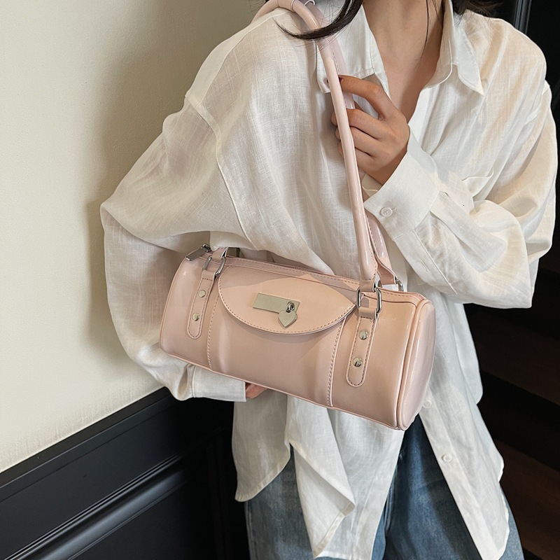Rivet motorcycle hand-held Boston for women 2025 new niche design versatile single shoulder armpit bag