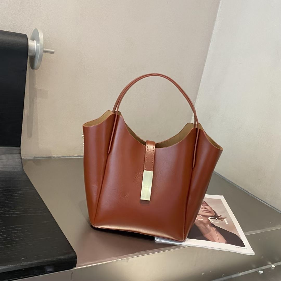 New women's version niche design handbag commuting multifunctional shoulder bag solid color designer versatile shopping basket bag large=capacity