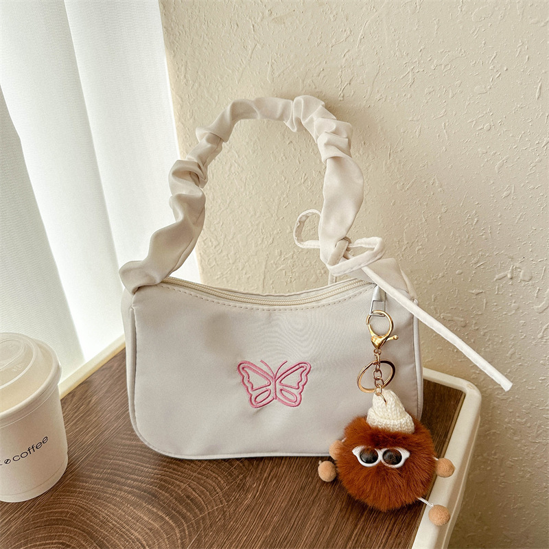 Luxury underarm ins niche female student small 2025 new pleated cloud bag, shoulder bag