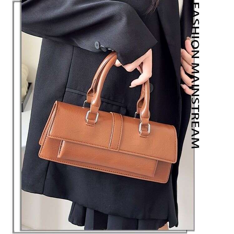 Niche 2025 new high-end crossbody handbag shoulder motorcycle ins Japanese Korean French stick bag