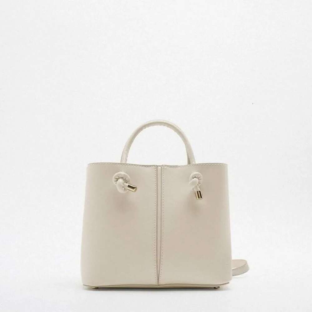 New Handheld Fashionable Simple Temperament Commuter Solid Color Mini City Leisure Handbag High Texture Large Capacity Bag