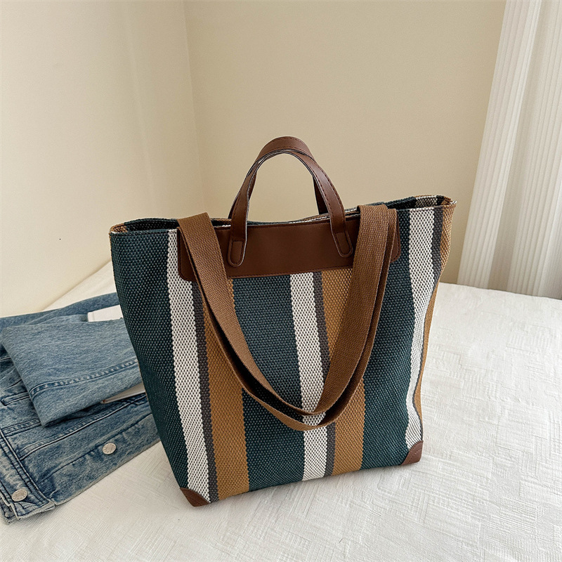 Free Delivery Designer Bag Large Hand For Women In Winter 2025 Fashionable Contrasting Striped Canvas Hand Commuting Tote Single Shoulder Armpit Luxur