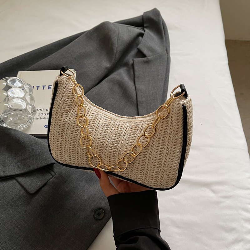 Summer New New Free Delivery Luxury Bag Designer Bag Versatile Fashion Grass Weaving Stick Underarm Simple Artistic Single Shoulder Handheld Crossbody