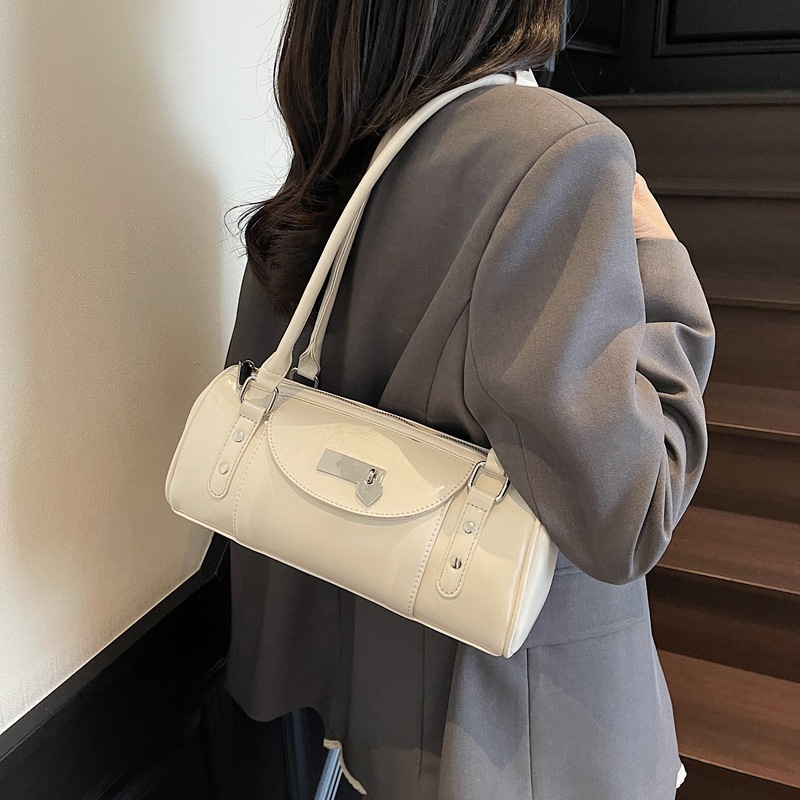 Rivet motorcycle hand-held Boston for women 2025 new niche design versatile single shoulder armpit bag
