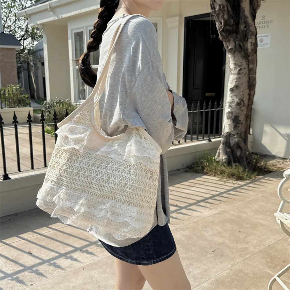 2025 new spring and summer leisure vacation fairy shaped lace mesh underarm large capacity single shoulder women's bag beach vacation bag trend h
