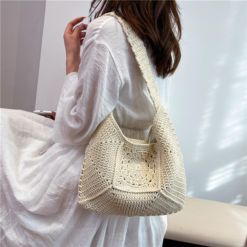 New single shoulder large capacity cotton thread new grass woven vacation beach bag designer multifunctional women's bag fashion trend commuting 