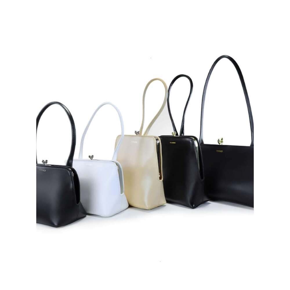 Trendy brand internet celebrity blogger with the same niche design versatile texture contrasting color goji berry clip hand held armpit bag