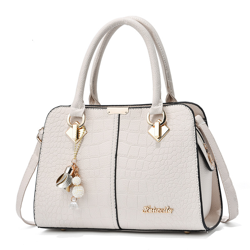 Top quality Brand High Quality New Style Free Delivery Designer Bag Middle aged fashionable women's handbag Korean version simple mother shoulder