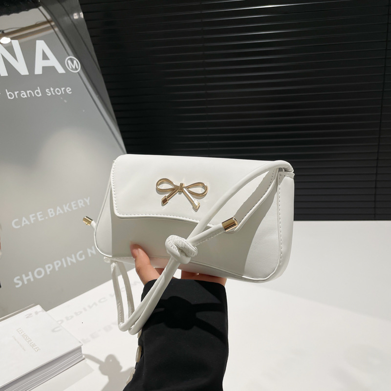 New Solid Color Luxury Bag New Free Delivery Designer Bag Beautiful Fashion Korean Version Bow Western Style 2025 Spring Single Shoulder Casual Undera