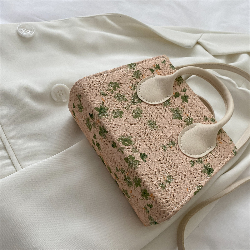 High quality brand fashionable westernized handheld small square fresh and sweet cross shaped mobile phone summer new item women's shoulder bag f