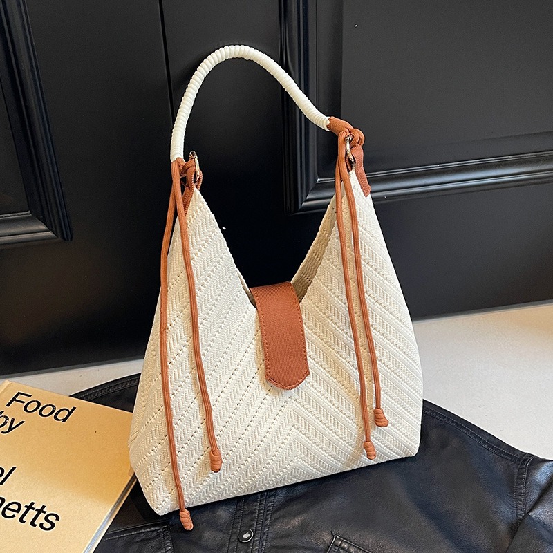 New fashion trend, simple temperament, woven armpit tote bag, women's multifunctional designer, high beauty, lightweight shoulder bag, knitted to