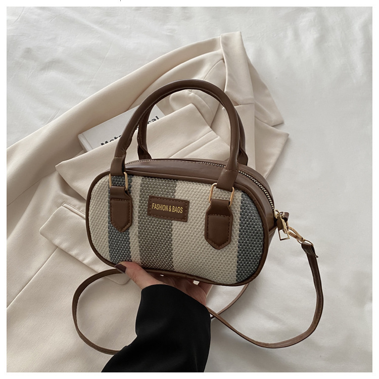New bag texture striped contrast handheld 2025 new designer high-end retro Boston shoulder crossbody bag simple and fashionable