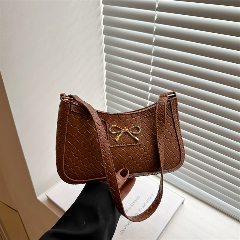 Sweet Girl Heart New Free Delivery Designer Bag Weaving Pattern 2025 Spring New Simple Fashion Western Luxury Bag Style Bow Armband Shoulder Bag Premi