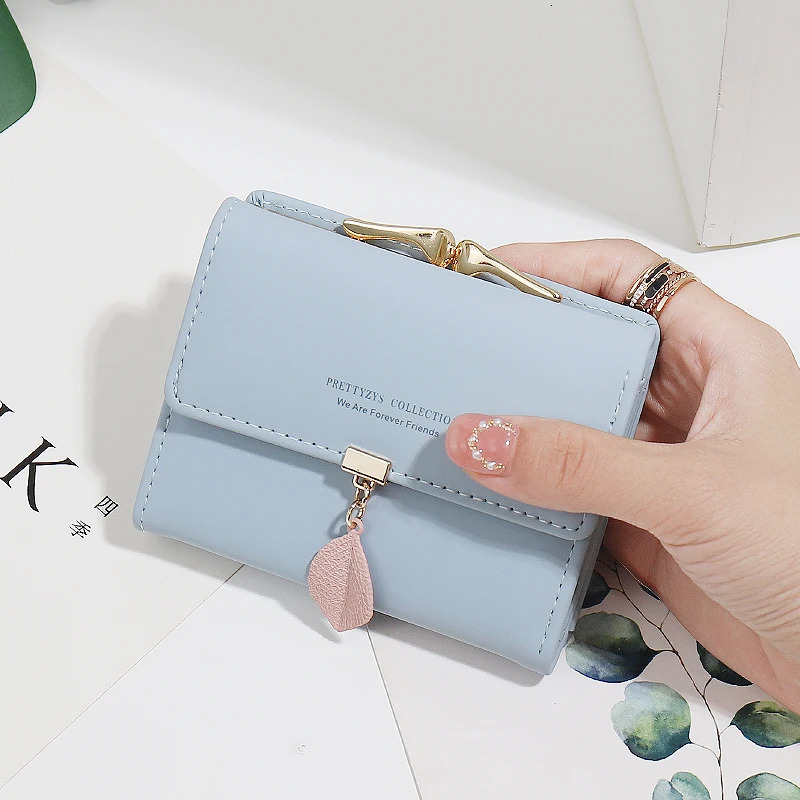 summer Explosion-style womens short wallet Korean PU leather simple everything with solid color personality leaf pendant b 250514