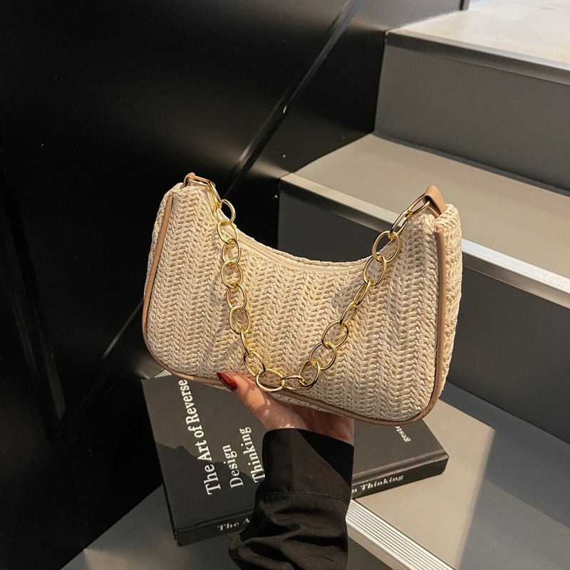 Summer New New Free Delivery Luxury Bag Designer Bag Versatile Fashion Grass Weaving Stick Underarm Simple Artistic Single Shoulder Handheld Crossbody