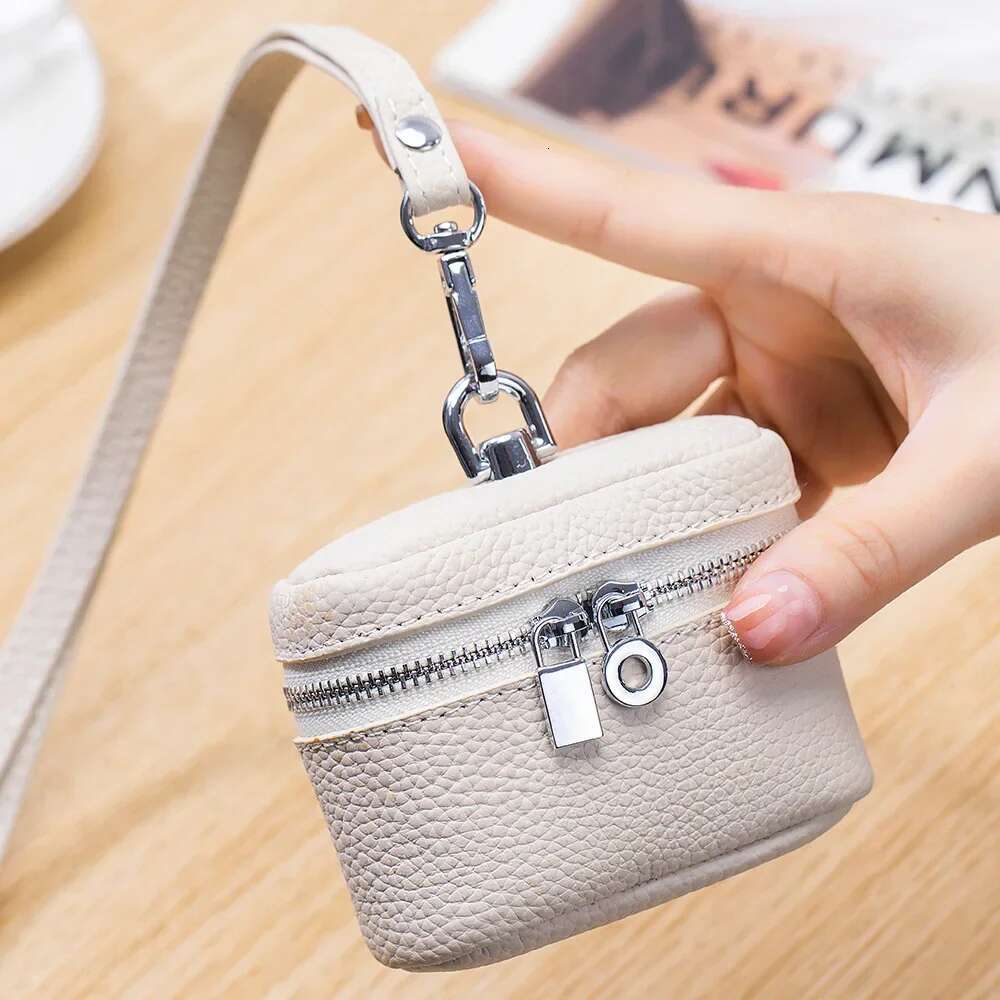New Women's Genuine Leather Compact Halterneck Coin Purses Simple And Portable Makeup Storage Bag Mini Headphone Bags