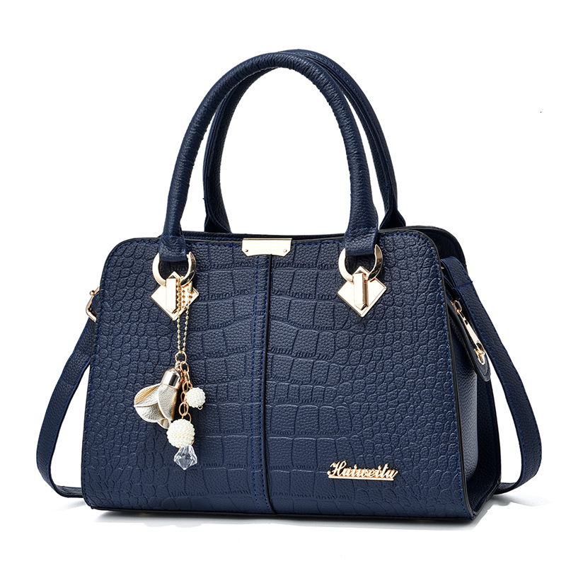 Top quality Brand High Quality New Style Free Delivery Designer Bag Middle aged fashionable women's handbag Korean version simple mother shoulder