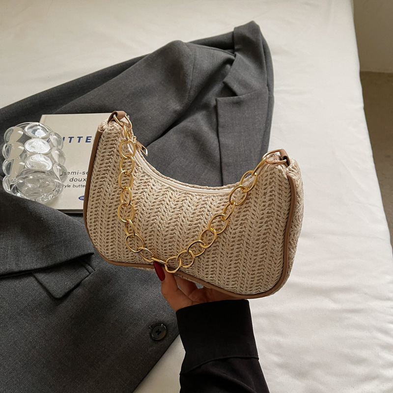 Summer New New Free Delivery Luxury Bag Designer Bag Versatile Fashion Grass Weaving Stick Underarm Simple Artistic Single Shoulder Handheld Crossbody