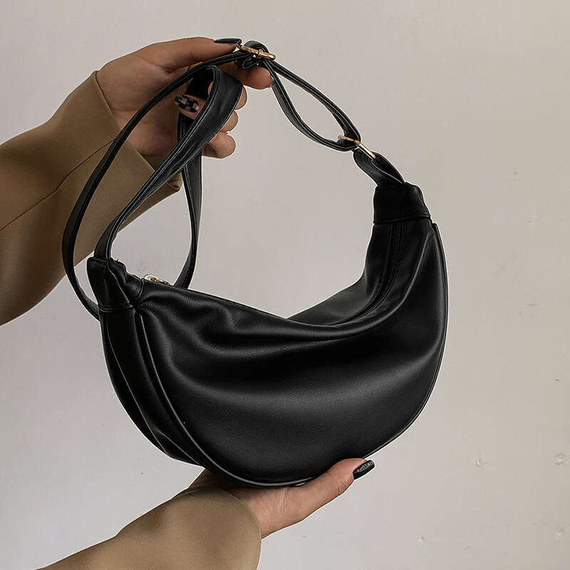 New western-style women's bag with fashionable texture, crossbody armpit bucket Japanese and Korean soft leather, solid color, single shoulder du