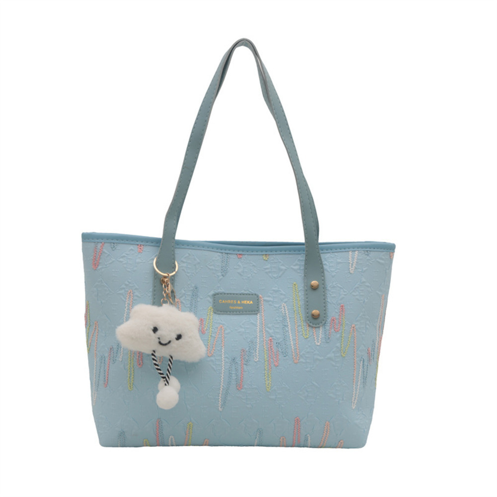 Handheld large capacity tote for women in autumn and winter 2025, new color blocking casual striped versatile high-end shoulder bag