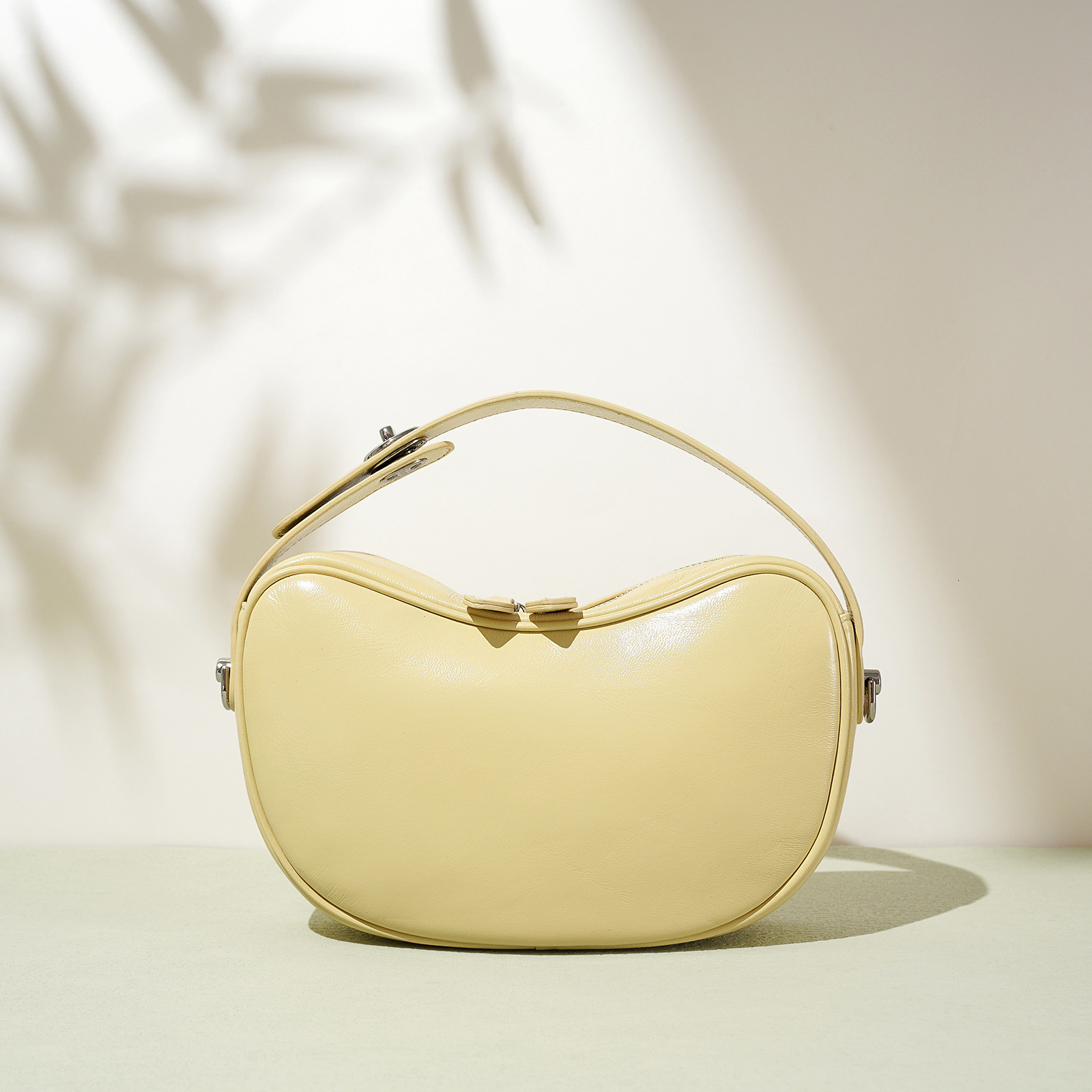 2025S designer pea sheepskin fashionable cashew niche design shoulder temperament high-end mother and child crossbody women bag
