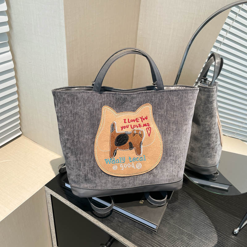 Free Delivery Designer Bag Cute Biscuit Cat Embroidered Backpack For Women 2025 Autumn/winter Large Capacity Single Shoulder Tote Commuter Crossbody B