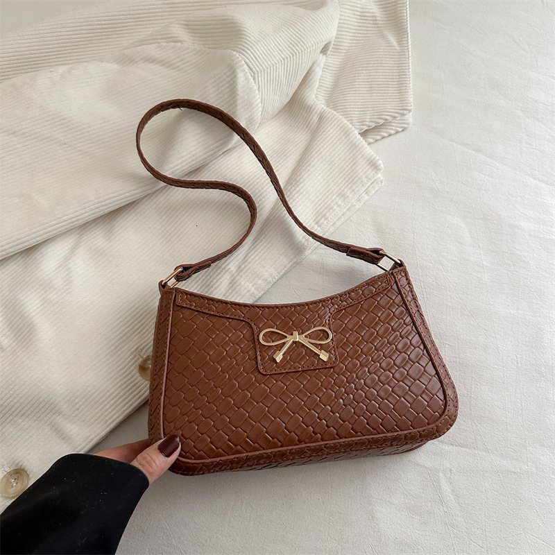 Sweet Girl Heart New Free Delivery Designer Bag Weaving Pattern 2025 Spring New Simple Fashion Western Luxury Bag Style Bow Armband Shoulder Bag Premi