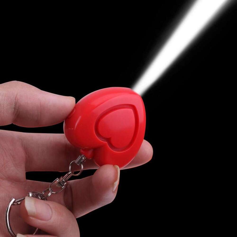Hot selling heart-shaped device, electronic gift, keychain, personal alarm, female anti wolf alarm