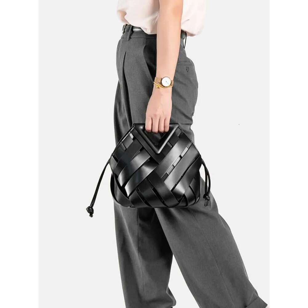 New Design Fashion Woven Genuine Leather Handbag French Portable Retro Trend Shoulder Hollow Out Bucket Bag